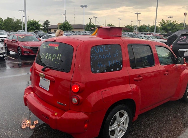 image of a red car in a parade