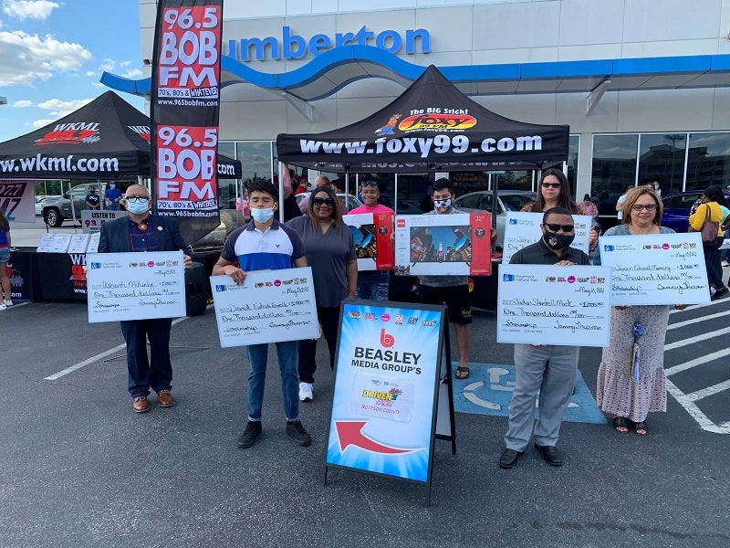 image of people holding up signs