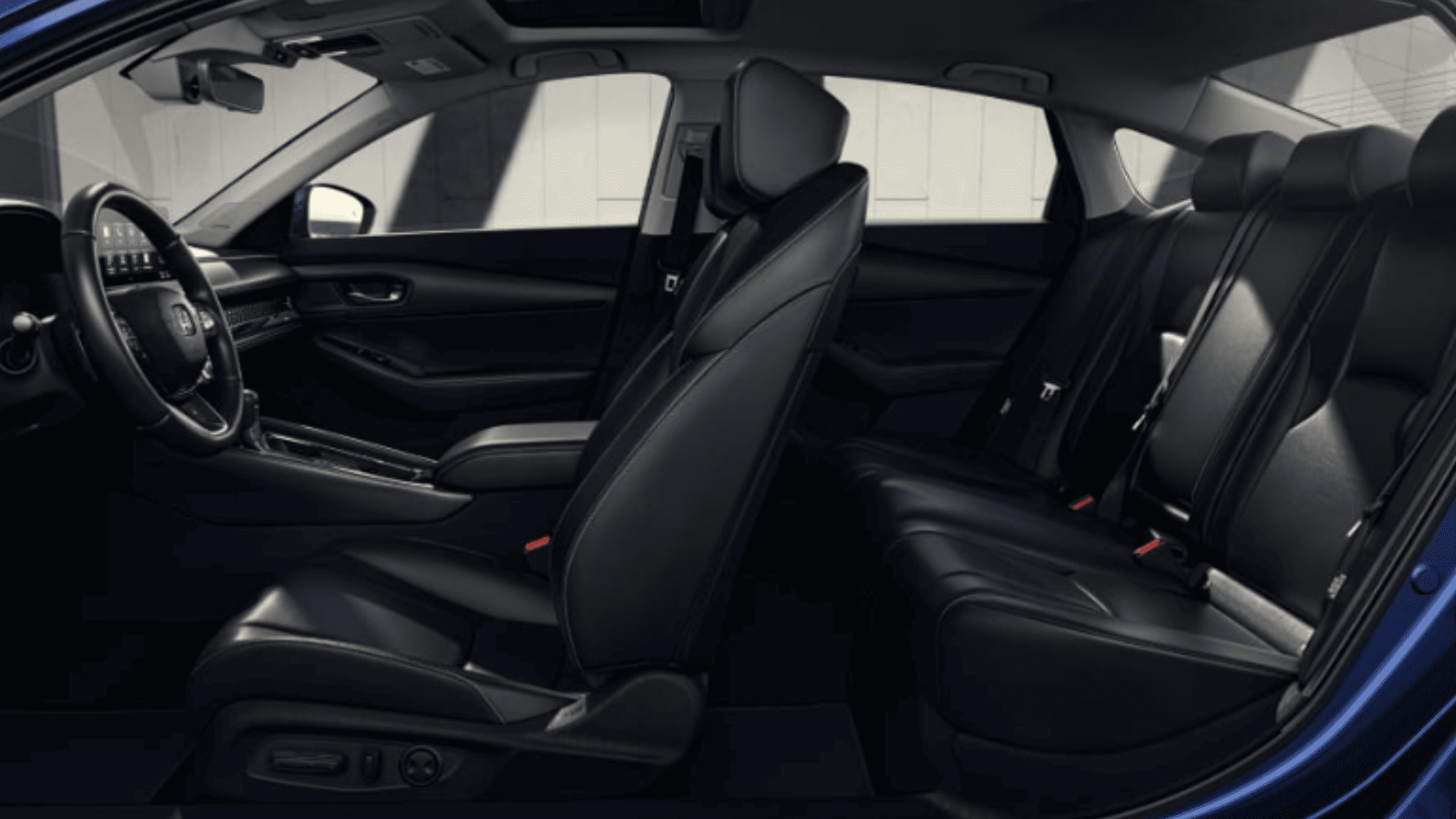 2026 Honda CR-V black interior cockpit with steering wheel, touchscreen display and center console