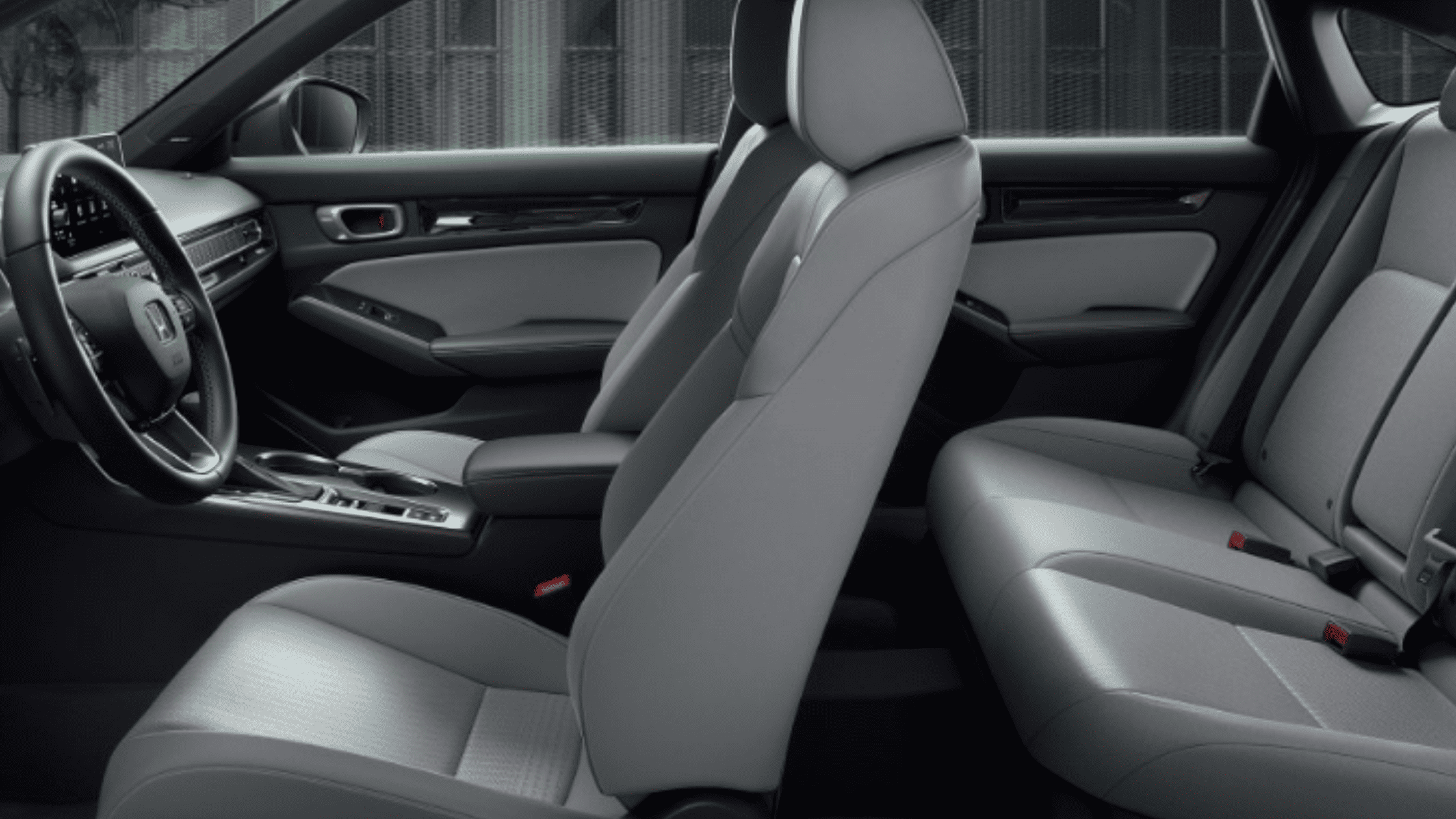 2026 Honda Civic Sedan gray cloth interior side view highlighting front and rear seating space