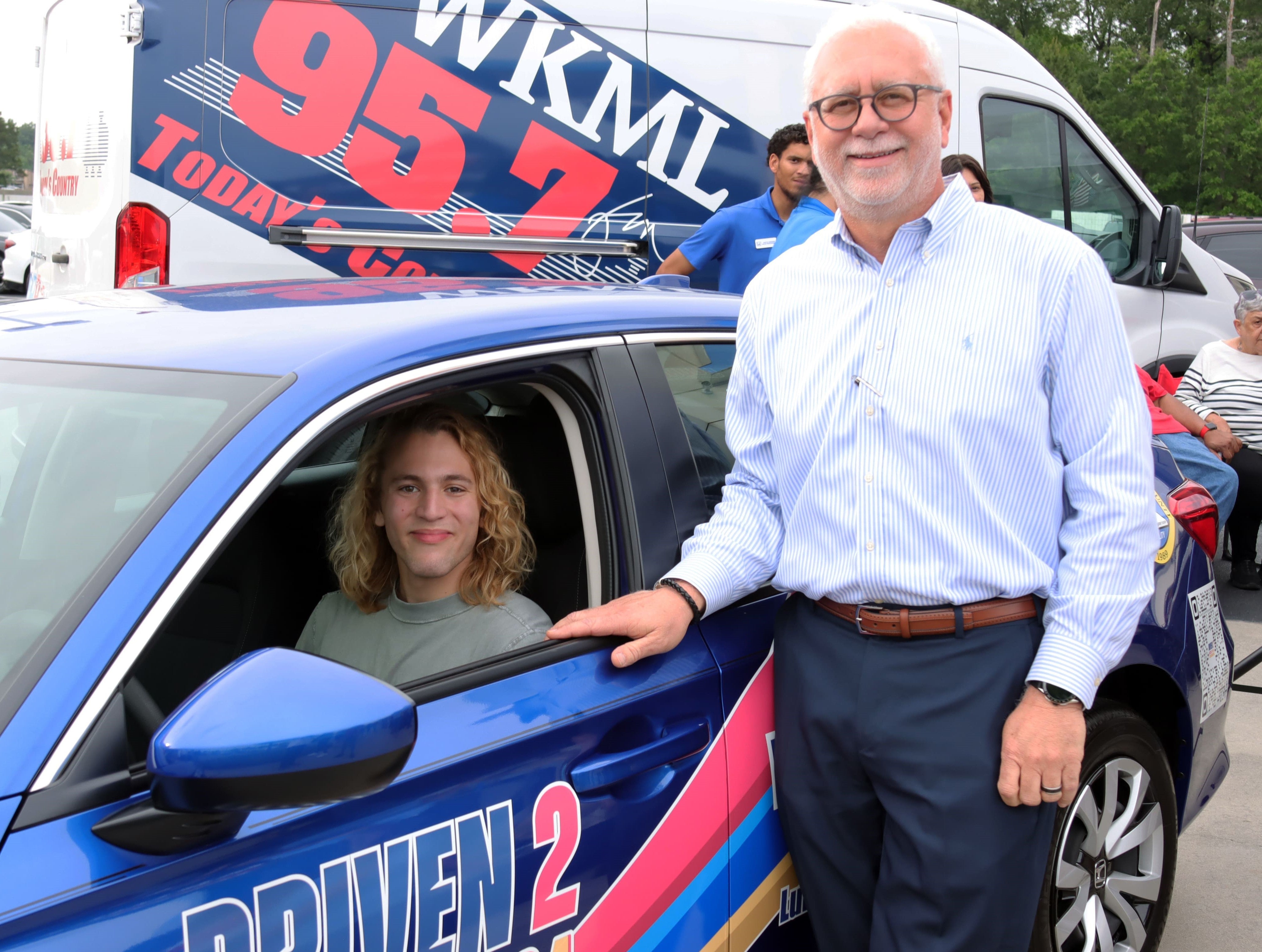 image of people holding up signs