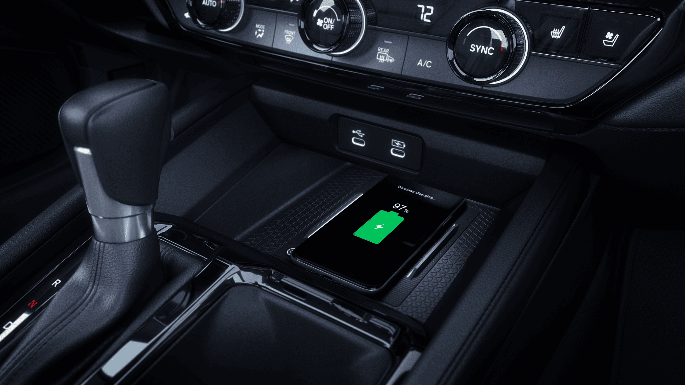 2024 Honda Accord Sedan interior showing wireless charging pad and controls.
