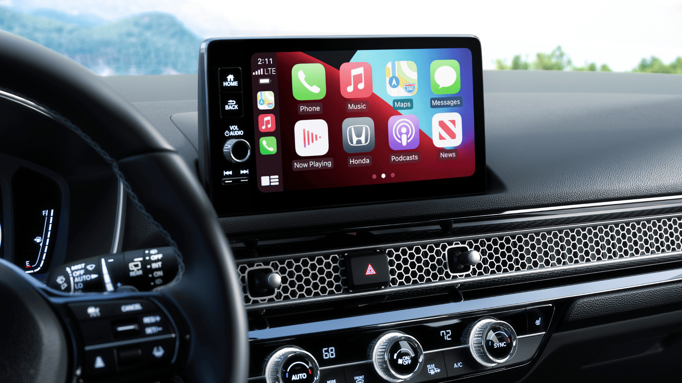 Close-up of the 2024 Honda Civic Hatchback’s infotainment screen with Apple CarPlay.