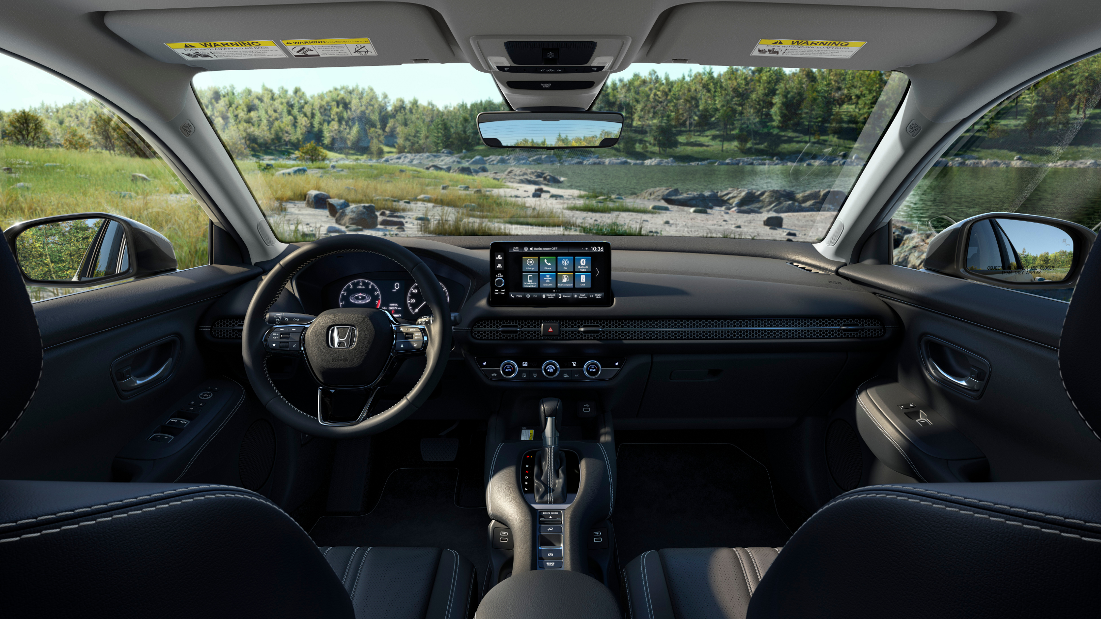 Honda HR-V interior showcasing modern dashboard and scenic outdoor view.