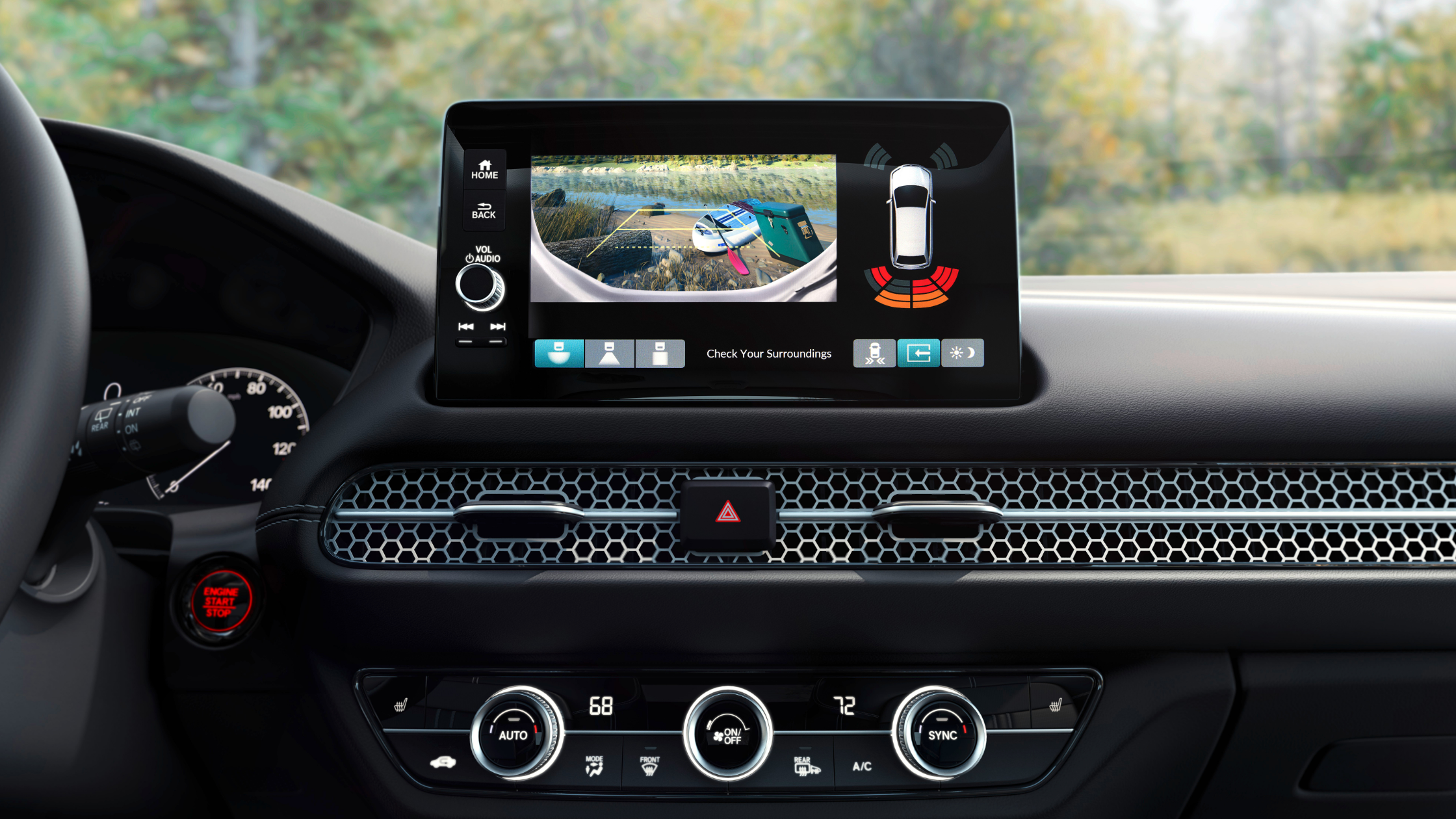 Close-up of Honda HR-V's infotainment display with parking assist visuals.